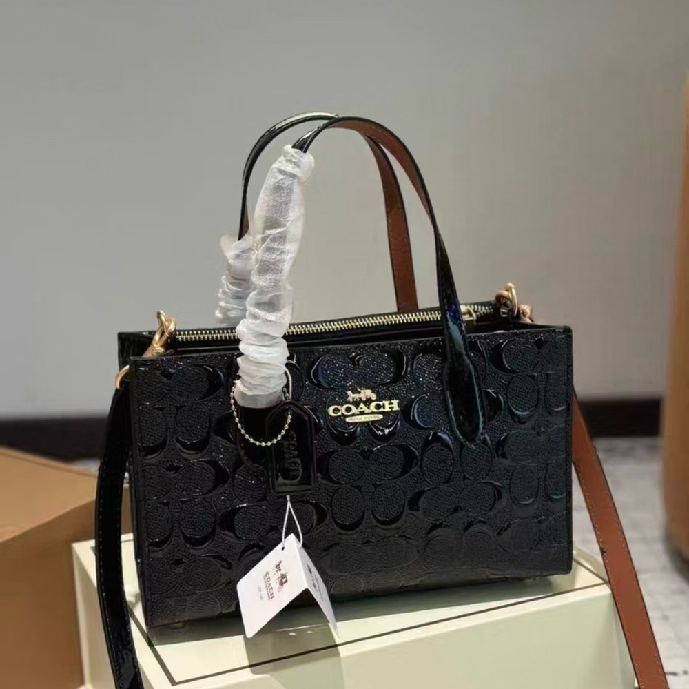 COACH black patent leather embossed tote bag